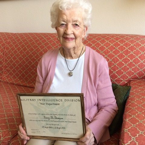 Nancy Tipton, holding a plaque in honor of her service during & after WWII. Nancy Tipton, holding a plaque in honor of her service during & after WWII.