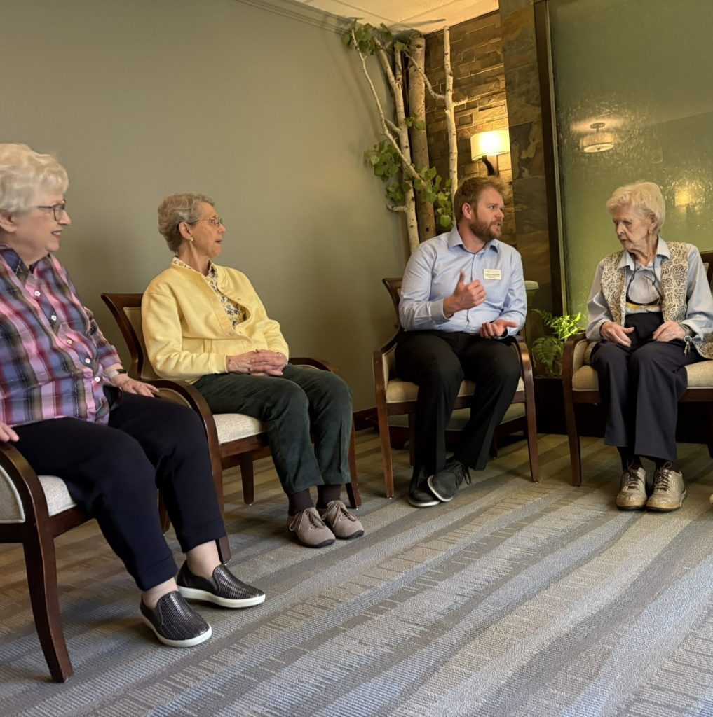Chaplain Smith connects with residents at Holly Creek.