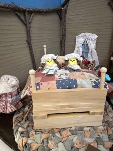 peeps sleeping in their little house on the prairie bed Peeps sleeping under their handmade quilt